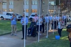 Remembering 21 with a rose and salute